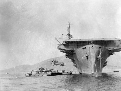 Escort carrier USS Bismarck Sea CVE-95 unloading airplanes