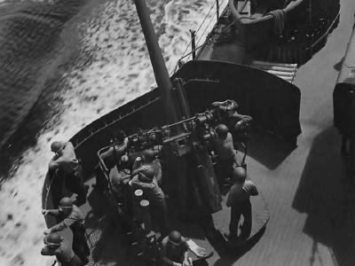 Gun Crew in Action aboard USS Nashville CL-43 off Kolombangara 1944