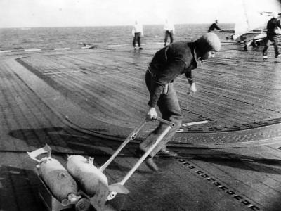 Sailor Hauls Bombs for US Navy Raid on Marshall and Gilbert Islands 1942