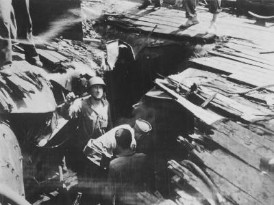 USS Birmingham CL-62 ripped by Kamikaze Okinawa May 1945