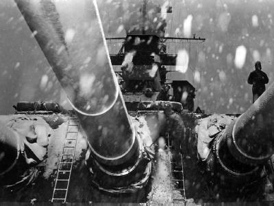 Snow falling over 16 Inch (406 mm) guns of battleship USS Alabama BB-60, 1944