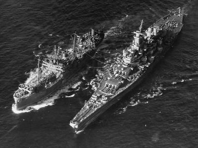 Fleet oiler of ServRon 6 refuelling Iowa-class battleship at sea 45