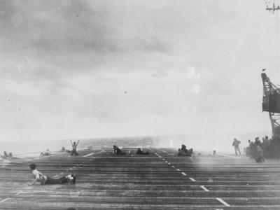 aircraft carrier USS Langley CVL-27 misses a close one