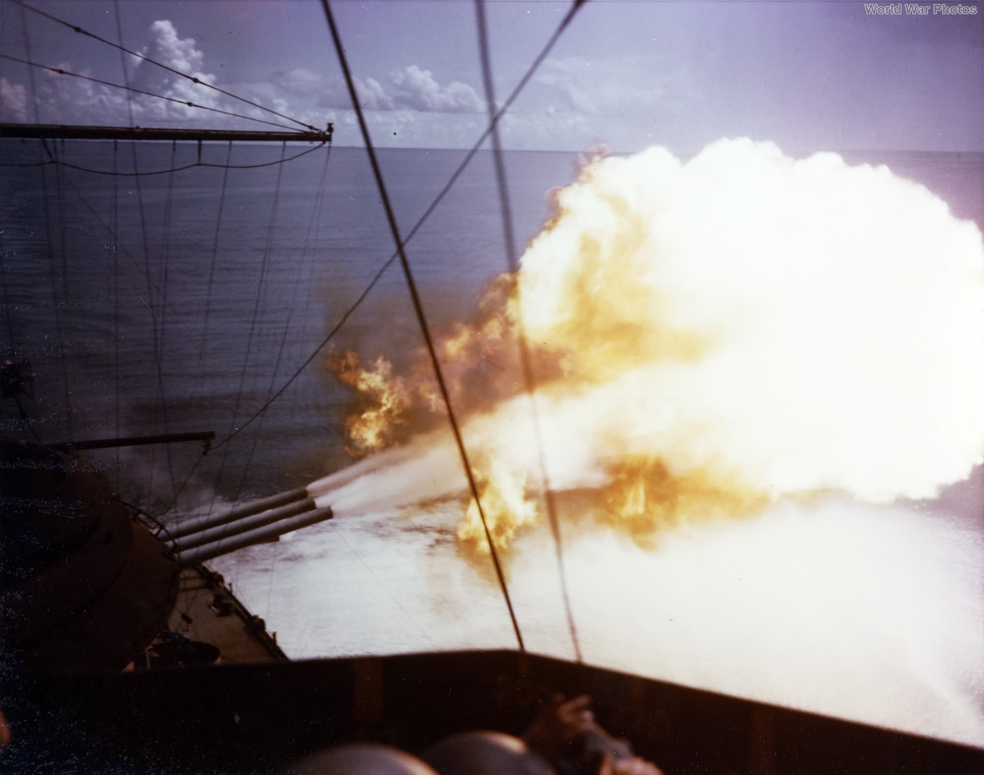 USS New Mexico firing her after guns during the pre-invasion bombardment of Guam 14-20 July 1944