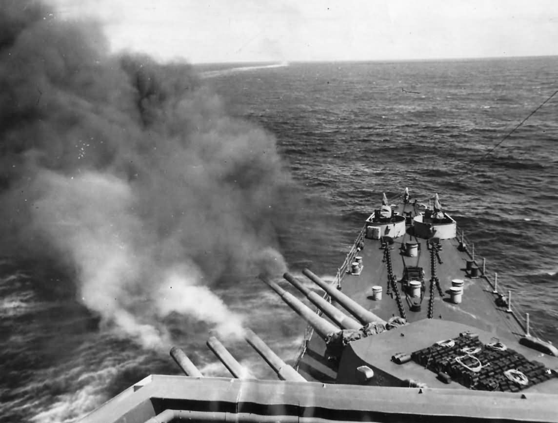 Heavy cruiser USS San Francisco CA-38 fires main guns during U S Navy raid on Wake Island October 1943