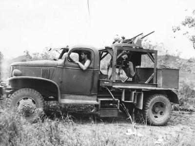U.S. troops in a Chevrolet E-5 turret training truck in New Guinea, 1943