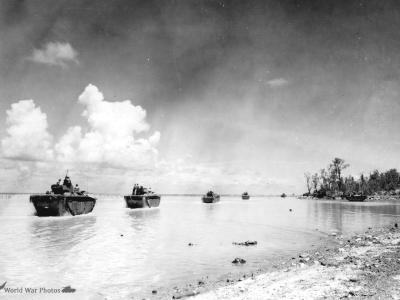 Amphibious tractors moving around death point on Peleliu