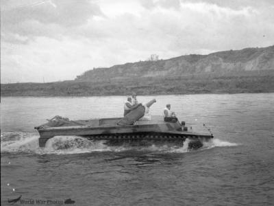 LVT-4 carrying 105mm howitzer and 55 sandbags