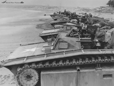 LVTs at beach maning machine guns