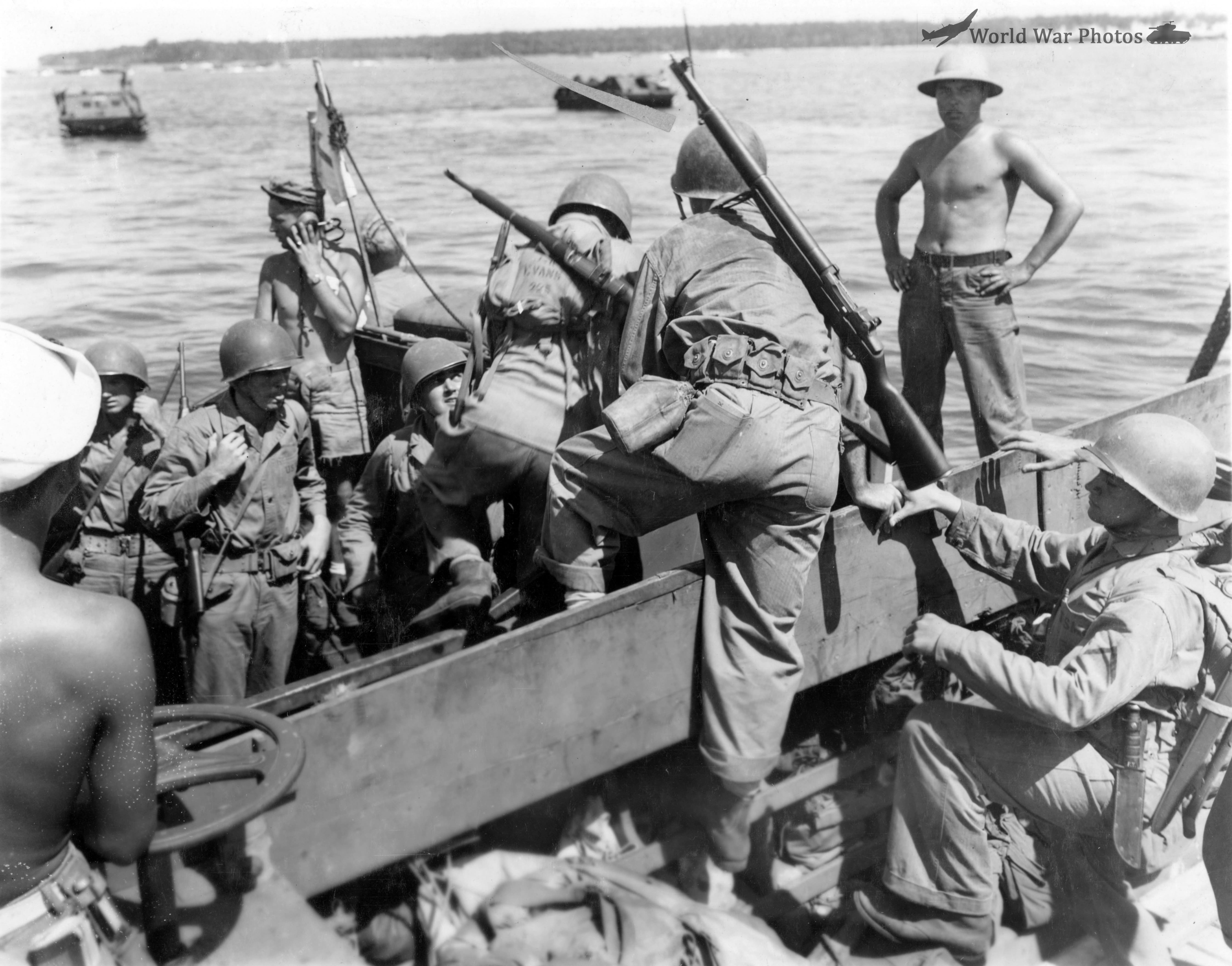 Transferring from Higgins Boats to amphibious tractors Guadalcanal 10 March 1944