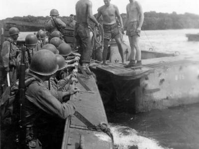 Transferring from Higgins Boats to amphibious tractors Guadalcanal 10 March 1944