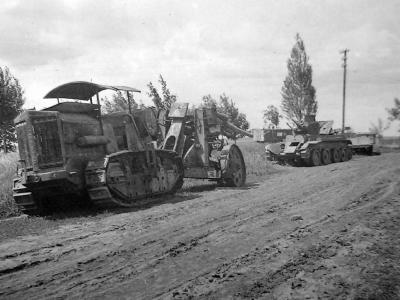 Soviet tractor Kommunar towing gun