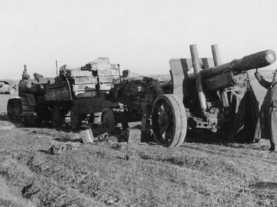 Stalinetz S-60 artillery tractor towing gun