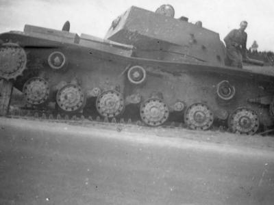 knocked out KV1 heavy tank with a bullet holes in its turret