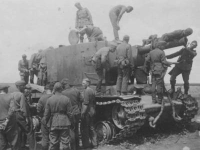 KV-2 tank and wehrmacht soldiers