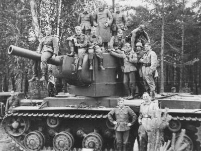 Heavy tank KV-2 (late) and wehrmacht soldiers