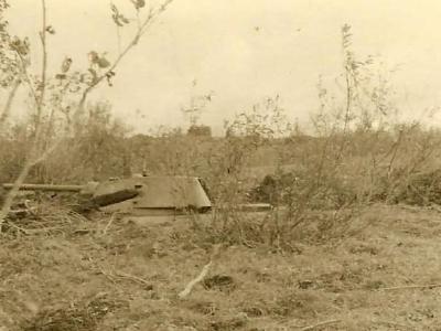 Abandoned T-34 tank in field