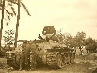 Abandoned T-34 tank on road