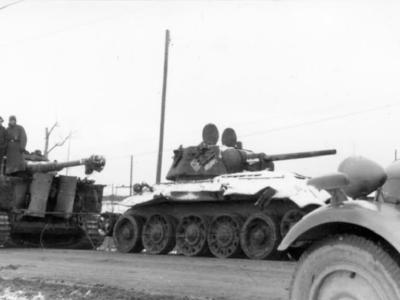 Panzer VI Tiger I towing T-34 tank