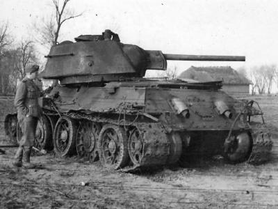 Burned out T-34 tank mod 1943 with cast hexagonal turret