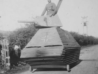 Wehrmacht soldier and Panzerattrappe T-34