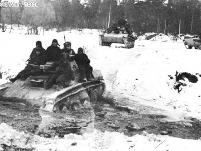 Russian troops riding on the T-60 tank